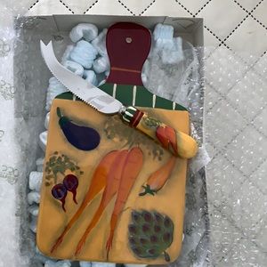 Saprana ceramic cheese plate with knife.